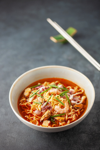 Jjamppong. Korean Seafood Noodle Soup in Bowl. Asian cuisine.