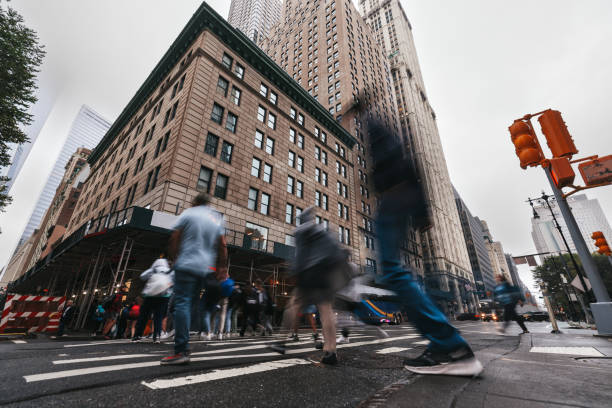 istock People crossing in Lower Manhattan, New York 1714779676