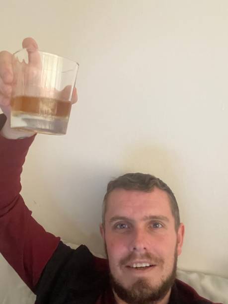 istock A celebration Christmas Day selfie with a beverage in hand 1714785791