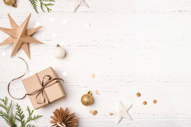 istock Festive Christmas background with gift box and Christmas decorations 1714789756