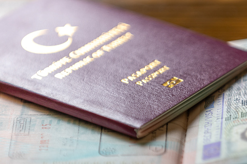 Schengen Visa and Turkish Passport.