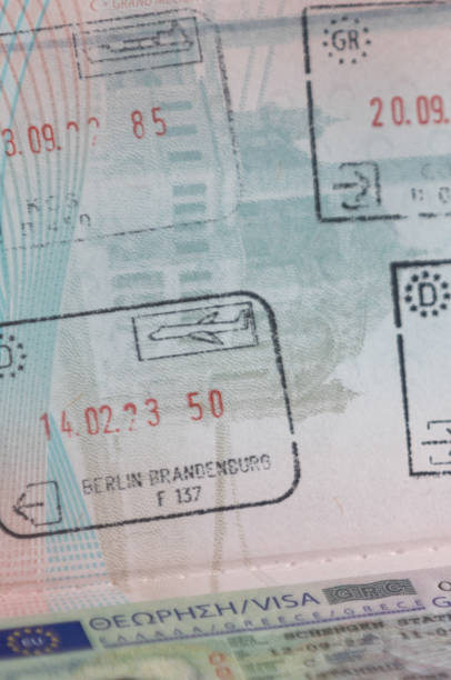 istock New Turkish passport with Schengen area stamps. 1714790887