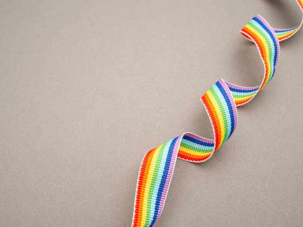 istock Rainbow cloth ribbon on a gray background 1714798757