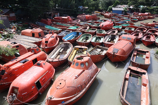 Lifeboats from ships are sold for re-use at an old ship breaking yard in Sitakunda, Chittagong, Bangladesh. The life boats of the old ships that were demolished are sold by the retailers for thirty thousand to eighty thousand taka depending on the type.