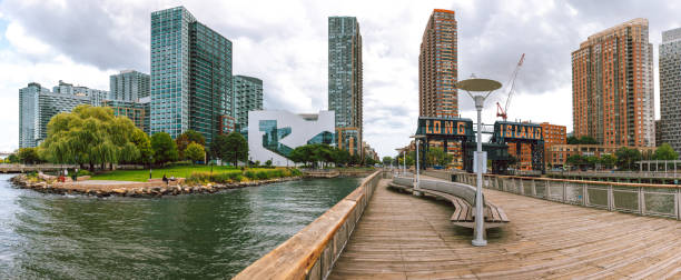 istock Long Island City, Queens, New York waterfront public park and new modern constructions 1714806029