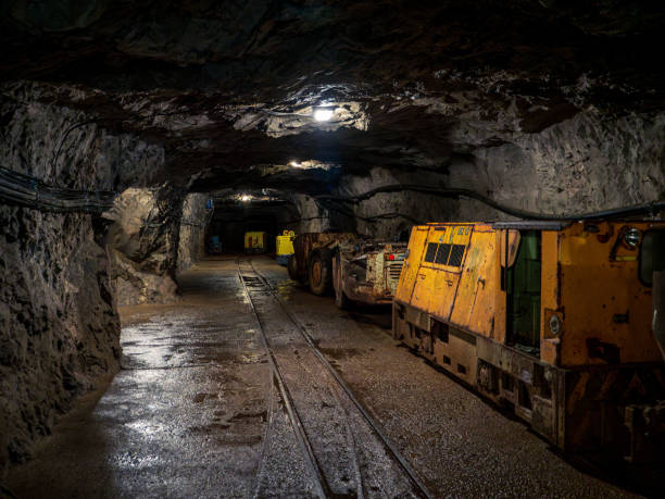istock Mining equipment machines in an underground coal mine tunnel 1714825587