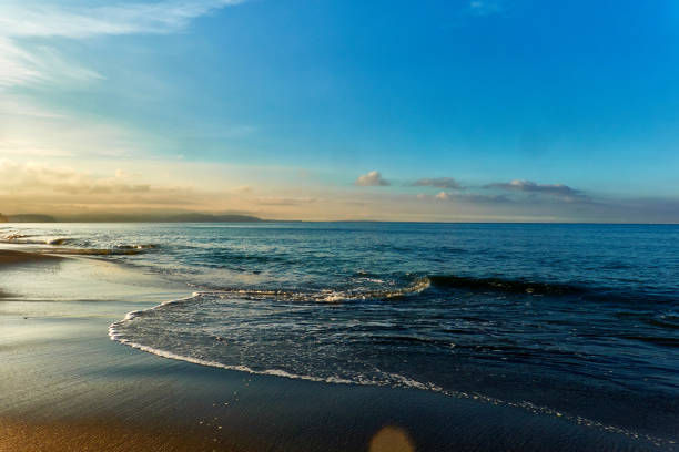 istock Scenic view of ocean against blue sky during sunrise 1714829549