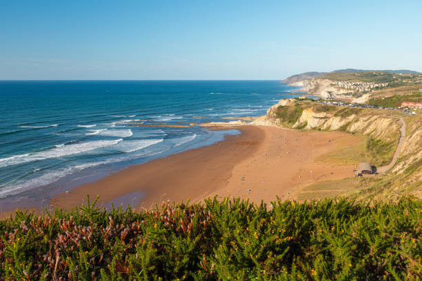 Landscape of sandy beach Sopelana near Bilbao, Basque country, Spain. Coastline with cliffs in Euskadi near Bilbo. Popular travel destination Landscape of sandy beach Sopelana near Bilbao, Basque country, Spain. Coastline with cliffs in Euskadi near Bilbo. Popular travel destination on vacations sopelana stock pictures, royalty-free photos & images