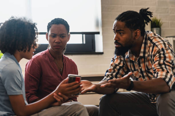 istock Parents talking with their teenage son about his smartphone usage 1714847882