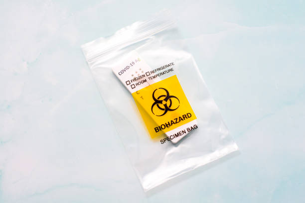 istock A covid-19 antigen test is discarded in a biohazard bio-waste bag 1714856735
