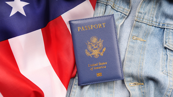 US passport in the jeans. American Citizenship day. National holiday of America. USA flag. 3d illustration