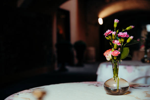 istock A small bouquet decorates empty tables in a European-style cafe for an intimate setting. 1714869084