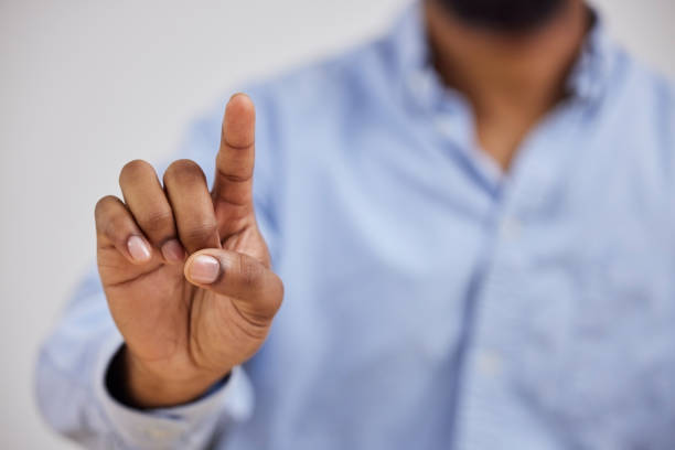Hand, fingerprint or biometrics with a person on an interface to select an option for virtual reality. Finger, future and safe with ai cyber security to access the metaverse closeup as an online user