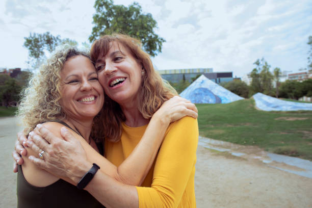 istock Friends walking in the park 1714895949