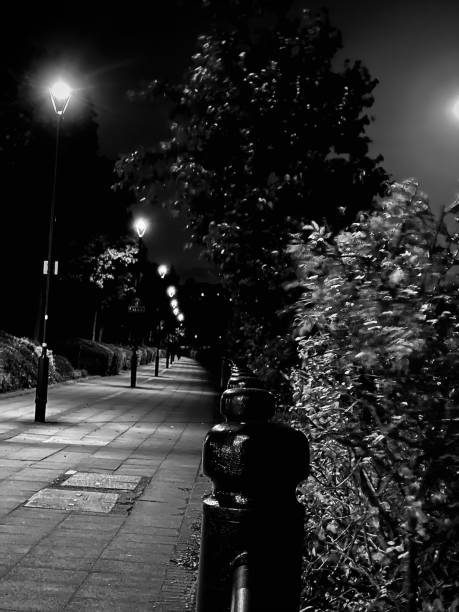 istock An empty sidewalk with streetlights at Newcastle Upon Tyne 1714900375