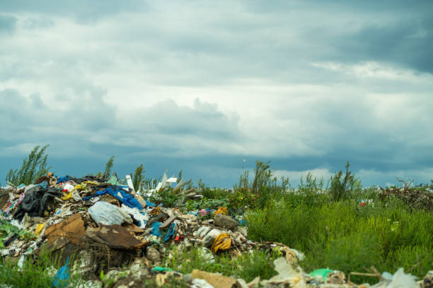 Mountain garbage waste in underdeveloped countries,stench, pollution,dangerous, sediment, sewage, dust, smoke, lead, heavy metals,Big garbage mountain