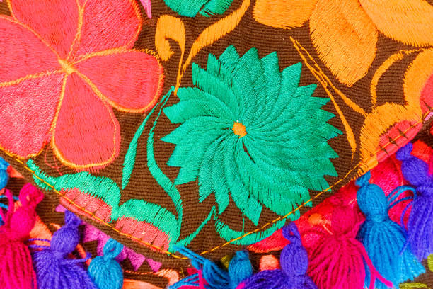 istock Embroidered flower design with colorful threads on a traditional Mexican style garment. 1714902004