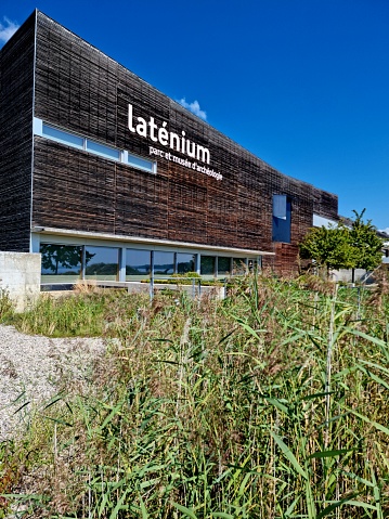 The Laténium is an archeology museum located in Hauterive, a suburb of Neuchâtel. The museum shows artefacts from the Upper Paleolithic, Bronze Age and Neolithic period. the image shows the museum captured during summer season.