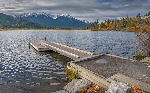 Autumn view of a dock at Vermilion Lakes in Banff National Park, Alberta, Canada