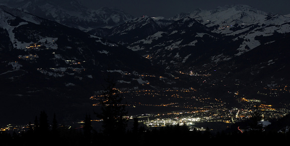 mountain range and valley at night