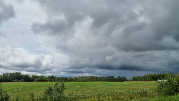 istock Evening landscape in summer with heavy clouds 1714911173