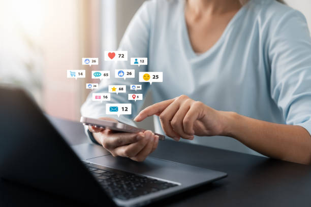 istock businesswomen Are working on smartphones and laptop use the search engine optimization tool. To find customers promote and advertise online content for technology, marketing, and business concept. 1714911567