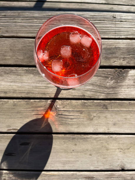 istock View of a red color cocktail and its shadow 1714942107