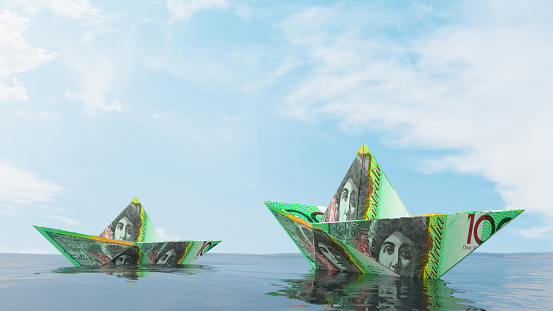 Paper Boats Made of Australian Dollar Bills Floating on an Open Sea. 3D Render