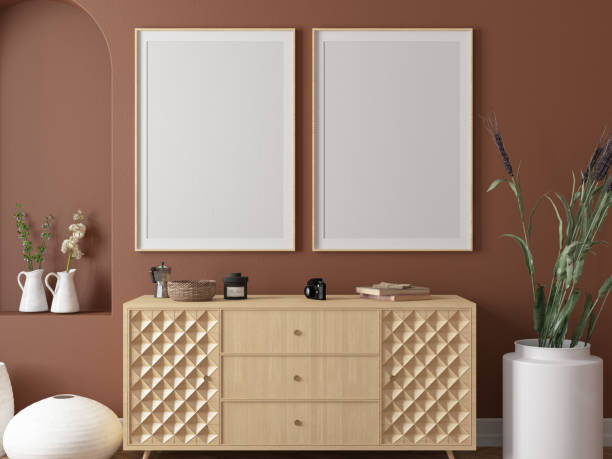 istock Two Empty Picture Frames on Cozy Room's Beige Wall 1714942992