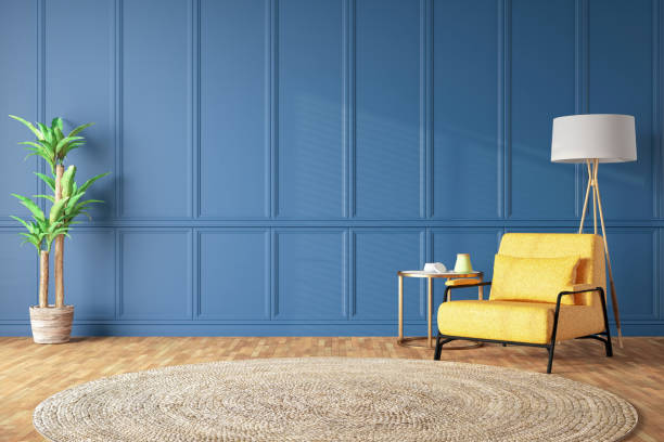istock Yellow Armchair and a Side Table with Empty Blue Wooden Wall Panels 1714943453