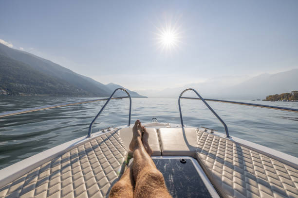 istock POV man's legs on a boat 1714944191
