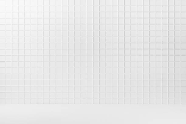 istock Abstract interior with white tiny square ceramic tiles on wall and wood floor or shelf, mockup, empty. Template for presentation, showing, design in modern minimalist style. 1714944201