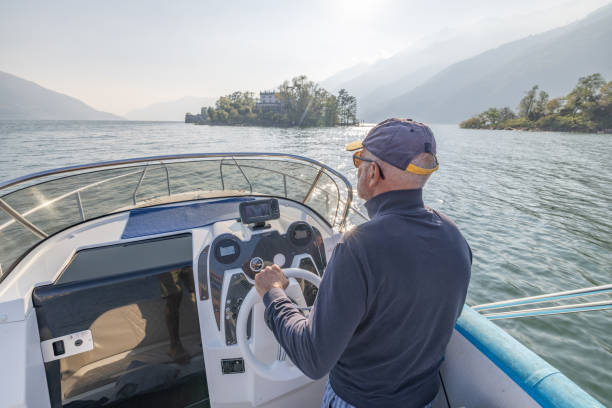 istock Mature man enjoying a day out on his boat 1714944260