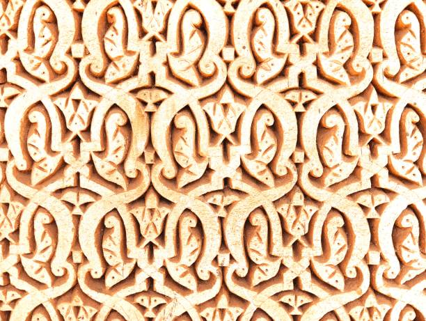 istock Abstract ornamented plaster wall  textured background. Beautiful moroccan traditional patterns background 1714952059