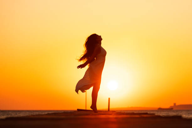 beautiful woman silhouette in backlight