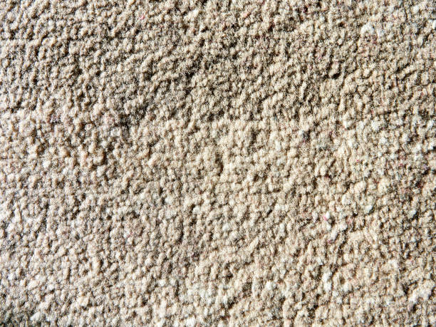 Abstract fabric backdrop. Texture, background, pattern. Close-up of brown fabric.