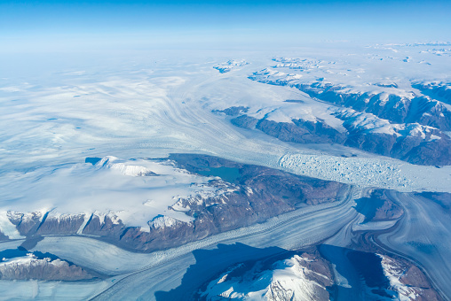 An aerial view of Green land with ice sheets.