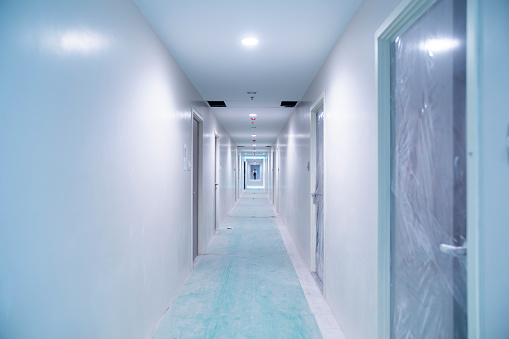 Walkway inside a construction site, hotel, or condominium.