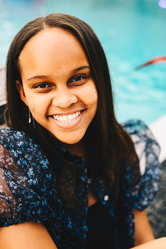 Sweet young lady in outdoor portrait