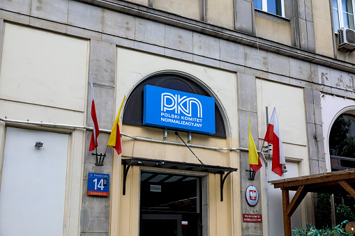 Warsaw, Poland - September 1, 2023: Blue PKN marking on the building of the Polish Committee for Standardisation (PKN), which is responsible for the organisation of standardisation activities.