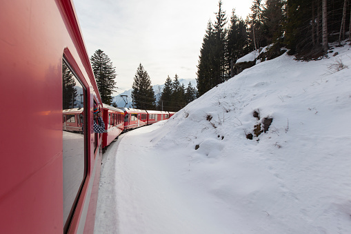 Red Swiss Express in the Bernina Pass, Winter Season Photo, Pontresina - Tirano, Switzerland