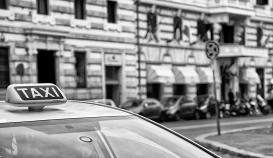 Rome Italy September 29, 2019 View of a traditional Italian taxi rolling through the streets of Rome in the morning