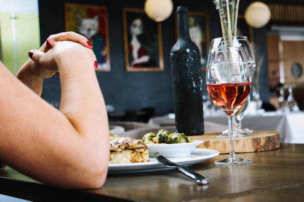 Woman eating in luxury restaurant