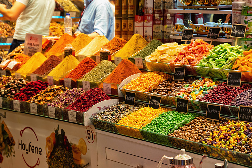 Istanbul, Turkey - July 05, 2018: Spices on the shelves in Spice Bazaar (Egyptian Bazaar) in Istanbul. Is one of the largest bazaars in the city. Located in the Eminonu quarter of the Fatih district.