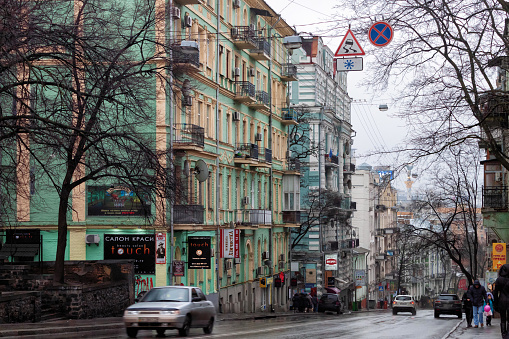 Kyiv, Ukraine - January 06, 2014: View of the historical streets in the center of the Kyiv in rainy winter day.