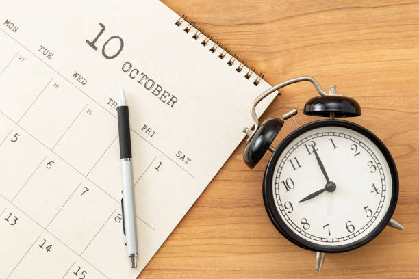 istock A calendar and an alarm clock on the desk. 1715139954