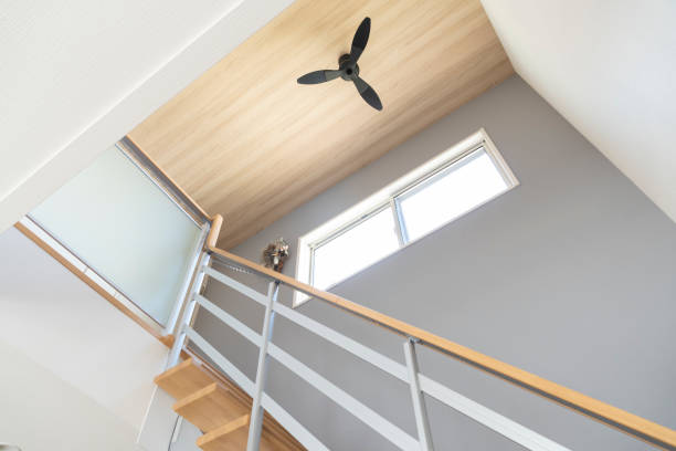Open staircase and vaulted ceiling in a newly built house.