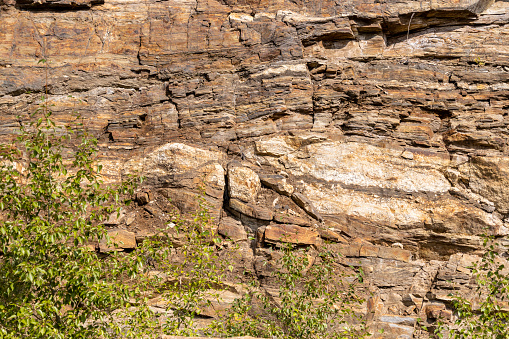 Sedimentary rock of side of mountain