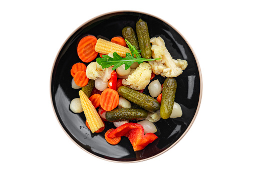 pickled vegetables salad cucumber, gherkin, carrot, onion, cauliflower, pepper appetizer meal food snack on the table copy space food background rustic top view
