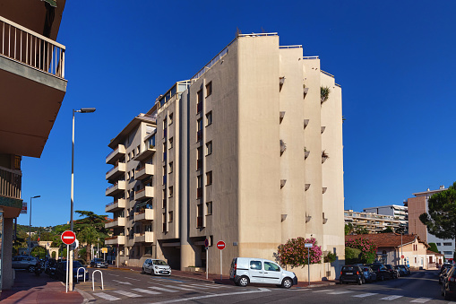 Cannes, France - June 19, 2017: View of the residential buildings in the city center of Cannes on a summer sunny day.